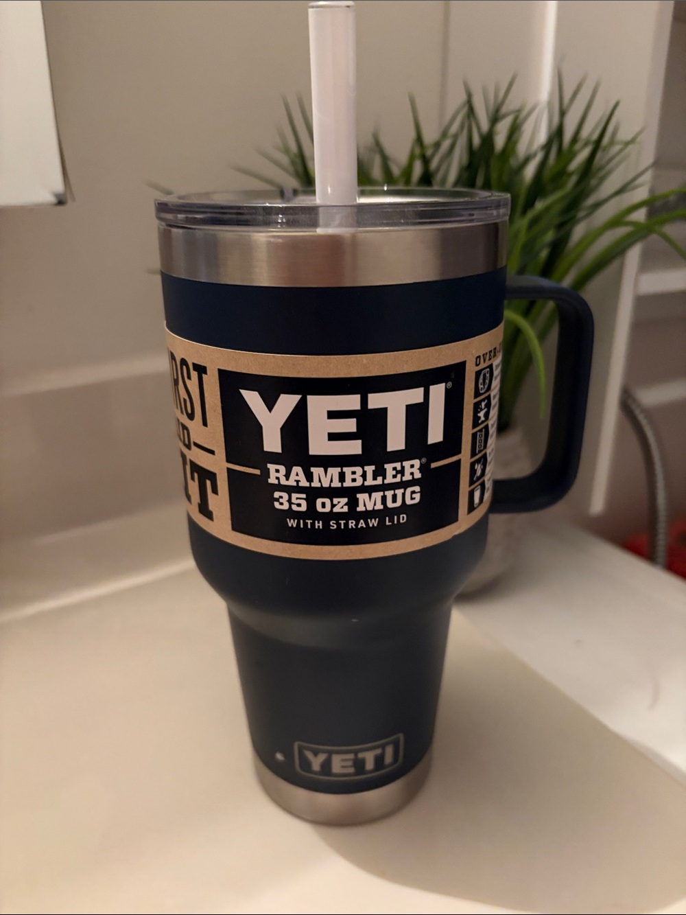 Yeti Rambler 35 oz Mug in Navy Blue with Straw Lid